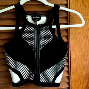 Bebe razorback, zip front crop tank; size XS.